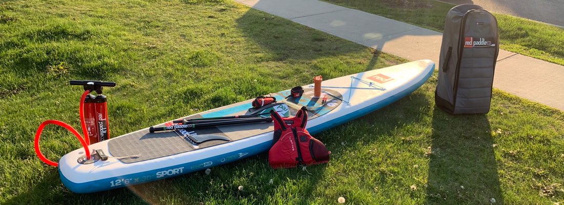 Stand Up Paddleboard and gear